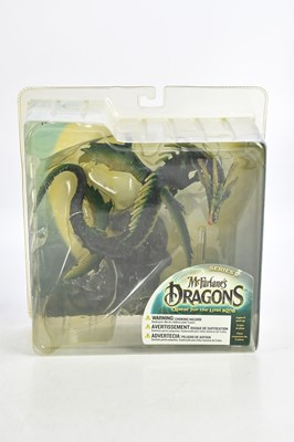 Lot 831 - Three boxed action figure by McFarlane Toys,...