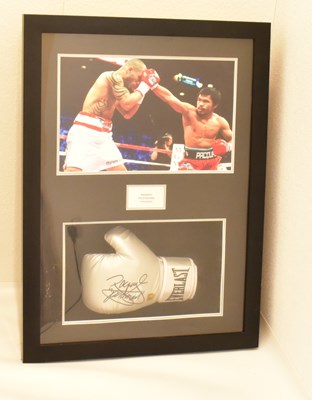 Lot 23 - MANNY PACQUIAO (PACMAN); a framed display...