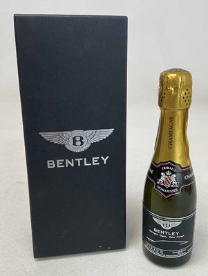 Lot 72 - CHAMPAGNE; a boxed bottle of Bentley Tribaut...