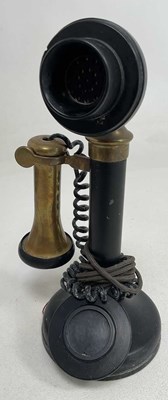 Lot 77 - A candle stick telephone, 32 cm