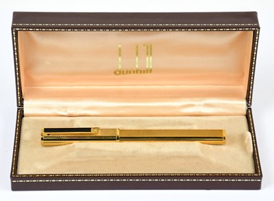 Lot 106 - DUNHILL; a gold plated fountain pen with...