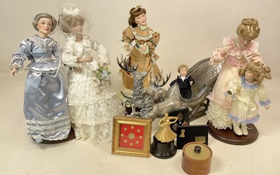 Lot 73 - A collection of six dolls, dancing trophies...