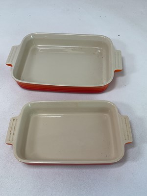 Lot 197 - LE CREUSET; a Volcanic Orange cast iron round...