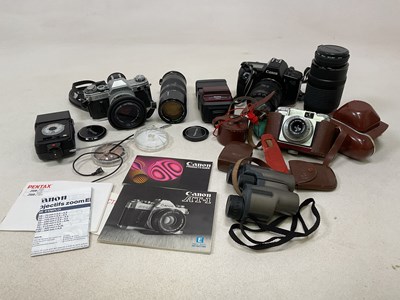 Lot 188 - A quantity of cameras, lenses and accessories,...