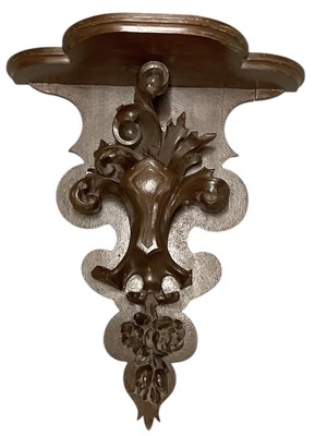 Lot 48 - An early 20th century carved mahogany wall...