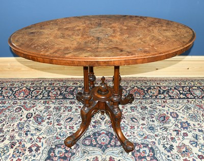 Lot 2829 - A Victorian walnut veneered loo table on four...