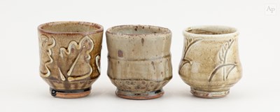 Lot 458 - MIKE DODD (born 1943); a trio of stoneware...
