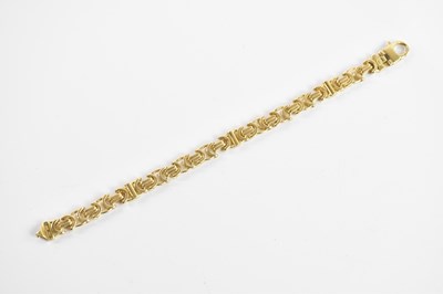 Lot 211 - An 18ct yellow gold bracelet, formed of shaped...
