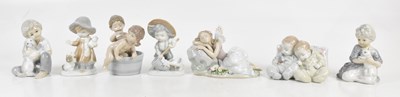 Lot 621 - LLADRÓ; three figures, babies sleeping,...