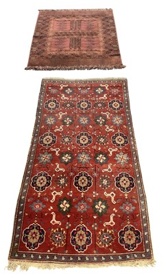 Lot 64 - A modern red ground Persian style carpet, with...