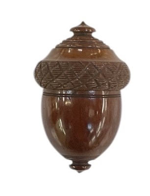 Lot 285 - A Victorian carved boxwood nutmeg grater, the...