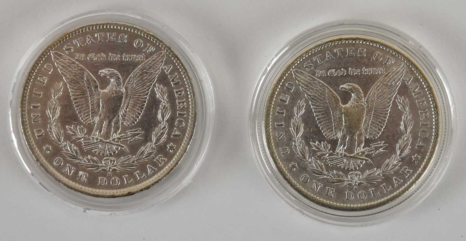 Lot 1491 - Two 19th century USA silver Morgan dollars,...