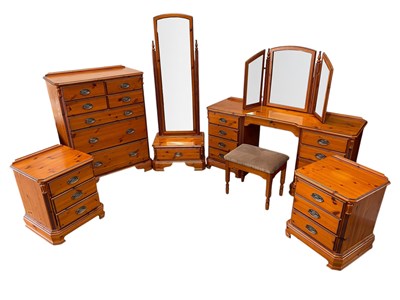 Lot 1071 - CROWN DUCAL; a pine bedroom suite comprising...