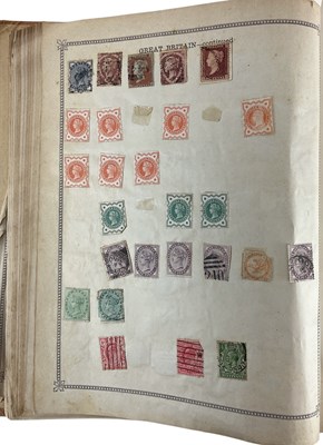 Lot 417 - An old Ideal stamp album including pages of GB...