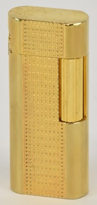 Lot 451 - IN THE STYLE OF CARTIER; a boxed gold plated...