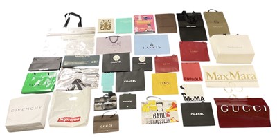 Lot 462 - A collection of designer dust bags and...