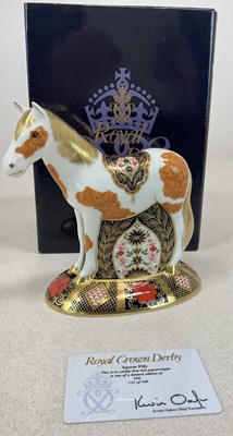 Lot 256 - ROYAL CROWN DERBY; an Epsom Filly paperweight...