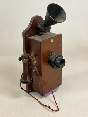 Lot 61 - An early 20th century mahogany wall telephone...