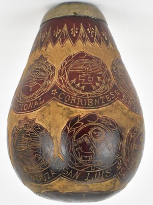 Lot 192 - A 19th century carved coquilla nut, the body...