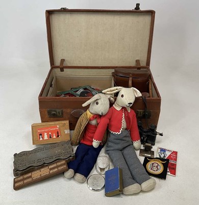 Lot 62 - A vintage leather suitcase containing a...