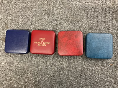 Lot 1462 - ROYAL MINT; four silver coins comprising Her...