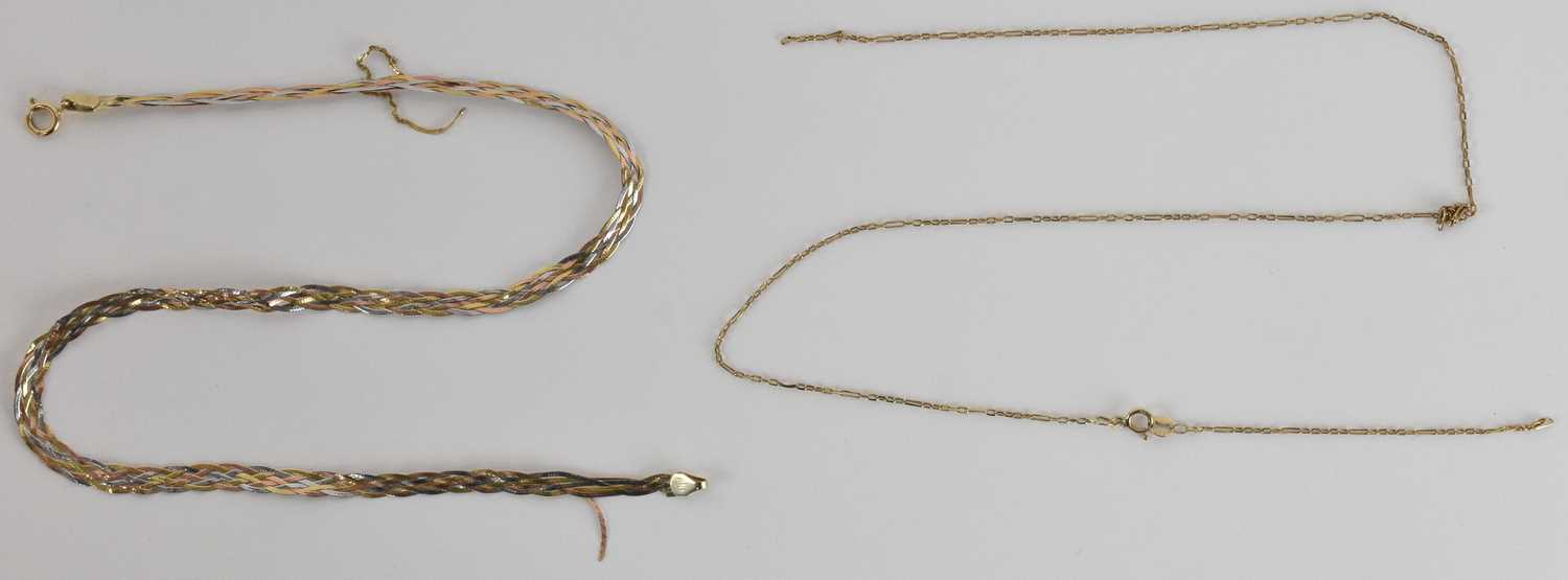 Lot 1217 - A three colour flat strand necklace with hoop...