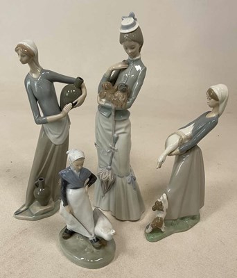 Lot 341 - ROYAL COPENHAGEN; a goose girl figure, and...