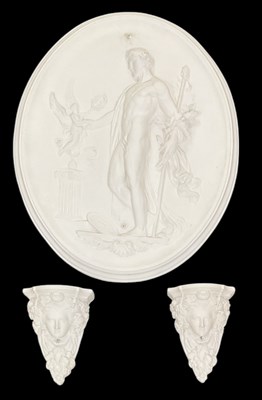 Lot 282 - A modern oval plaster relief wall hanging...