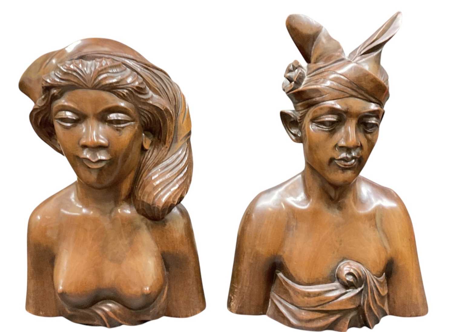 Lot 630 - Two early to mid 20th century Balinese carved...