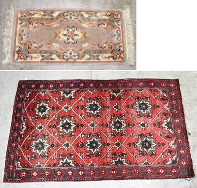 Lot 2684 - A Causcasian hand woven wool rug, decorated...