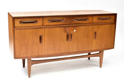 Lot 1 - G-PLAN; a 1960s teak sideboard with three...