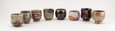 Lot 729 - A group of stoneware yunomi by different...