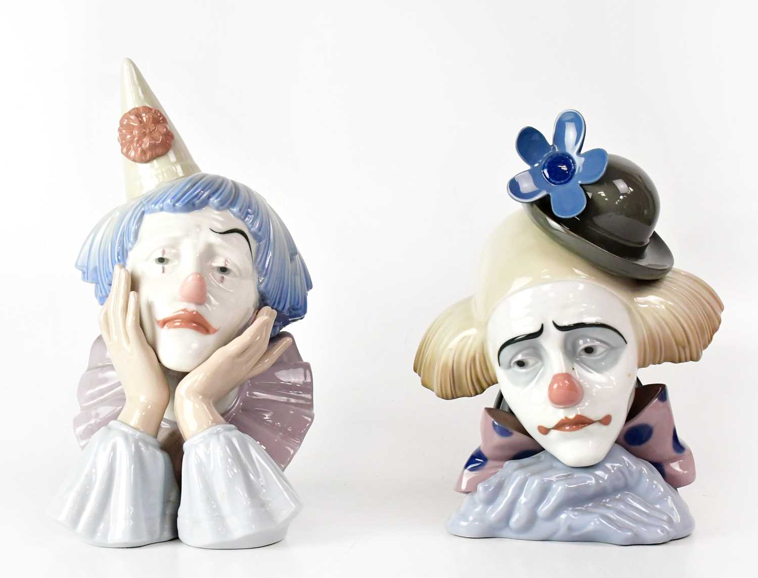 Lot 201 - LLADRÓ; two large busts of sad clowns,...