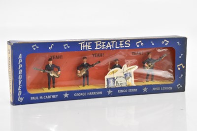 Lot 2105 - SUBBUTEO; The Beatles, the pop stars in...