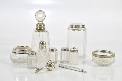 Lot 1355 - A collection of three cut glass and silver...