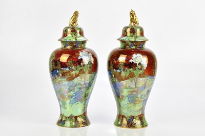Lot 391 - WILTON WARE; a pair of temple jars with covers,...