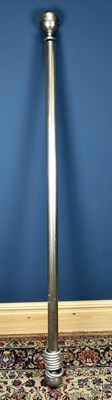 Lot 80 - A contemporary curtain pole with silvered...