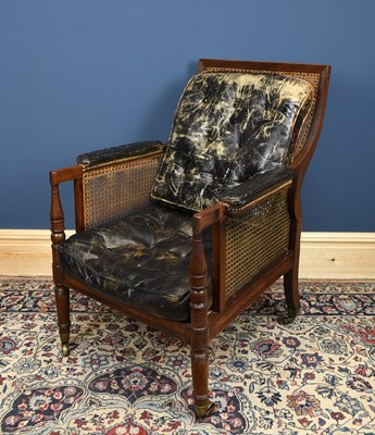 Lot 2712 - A Regency mahogany library chair, with curved...