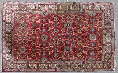 Lot 2662 - A Caucasian handwoven wool carpet, worked with...