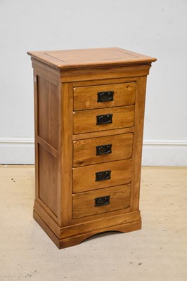 Lot 1083 - A modern oak five drawer chest, width 57cm,...