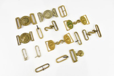Lot 1287 - Five military belt buckles, including Cheshire...