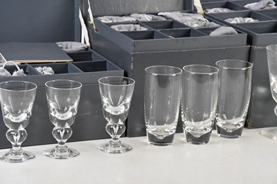 Lot 1688 - STEUBEN; three boxed sets of eight glasses of...