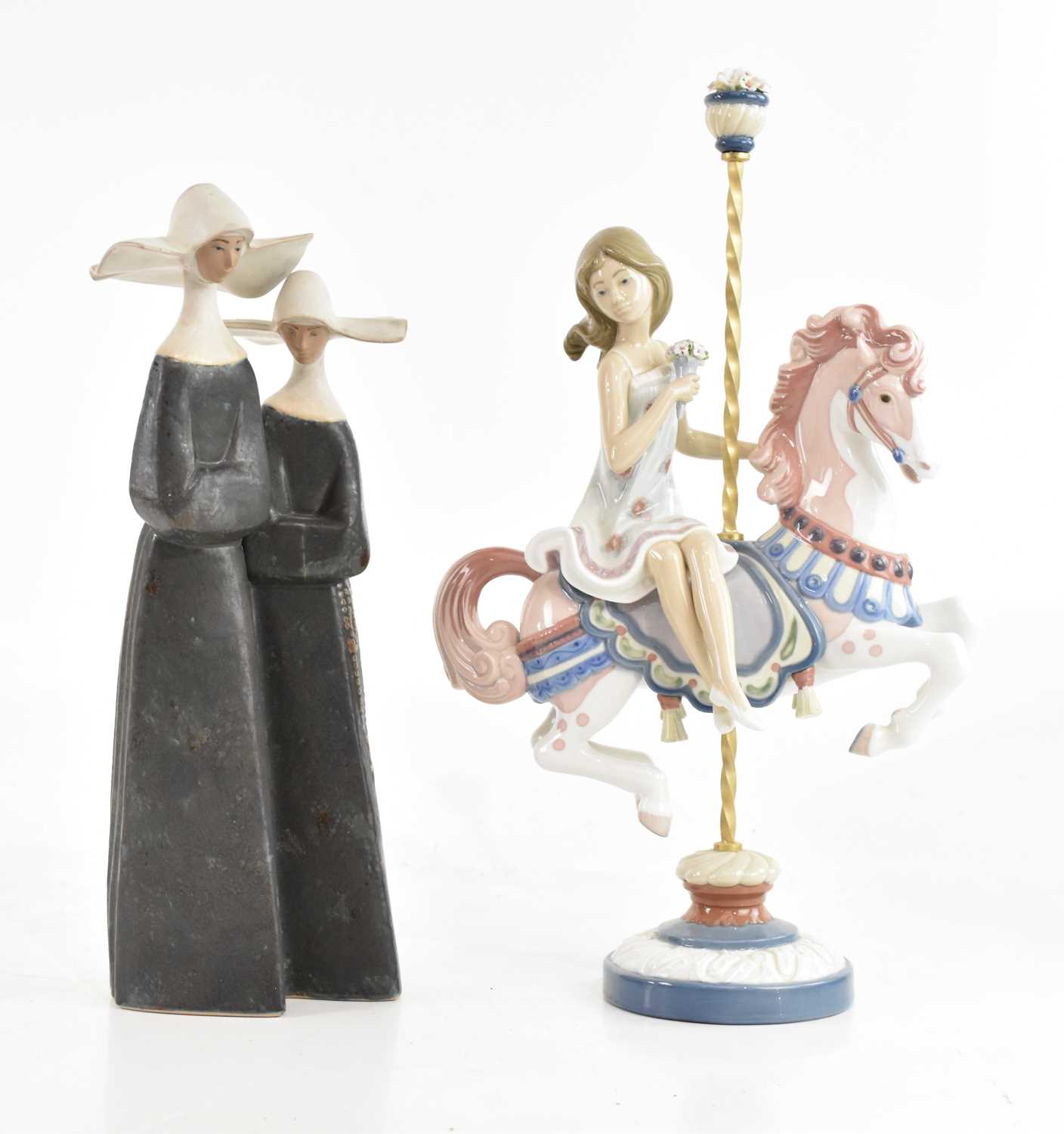 Lot 1530 - LLADRÓ; a figure, 'Girl on a Carousel', height...