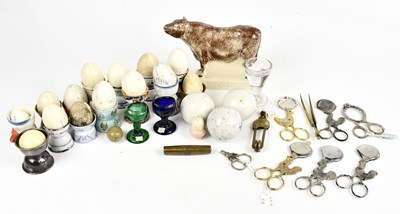 Lot 154 - A collection of assorted ceramic hen eggs,...