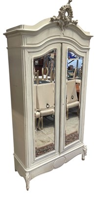 Lot 1076 - A reproduction white painted armoire, with two...