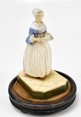 Lot 101 - An unusual Victorian hand painted composition figure of a maid