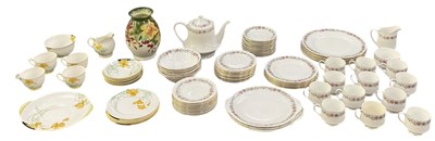 Lot 568 - ROYAL DOULTON; a part tea service, decorated...