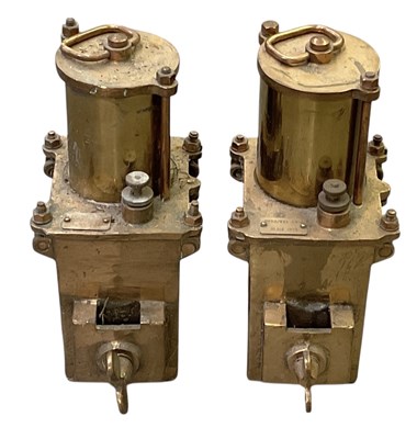 Lot 363 - A pair of brass submarine lamps, one with red...