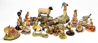 Lot 451 - A collection of twenty modern models of animals