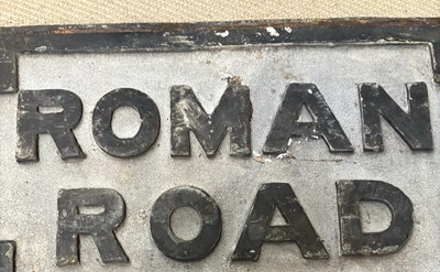 Lot 1344 - Two Victorian cast metal signs, 'Roman Road',...